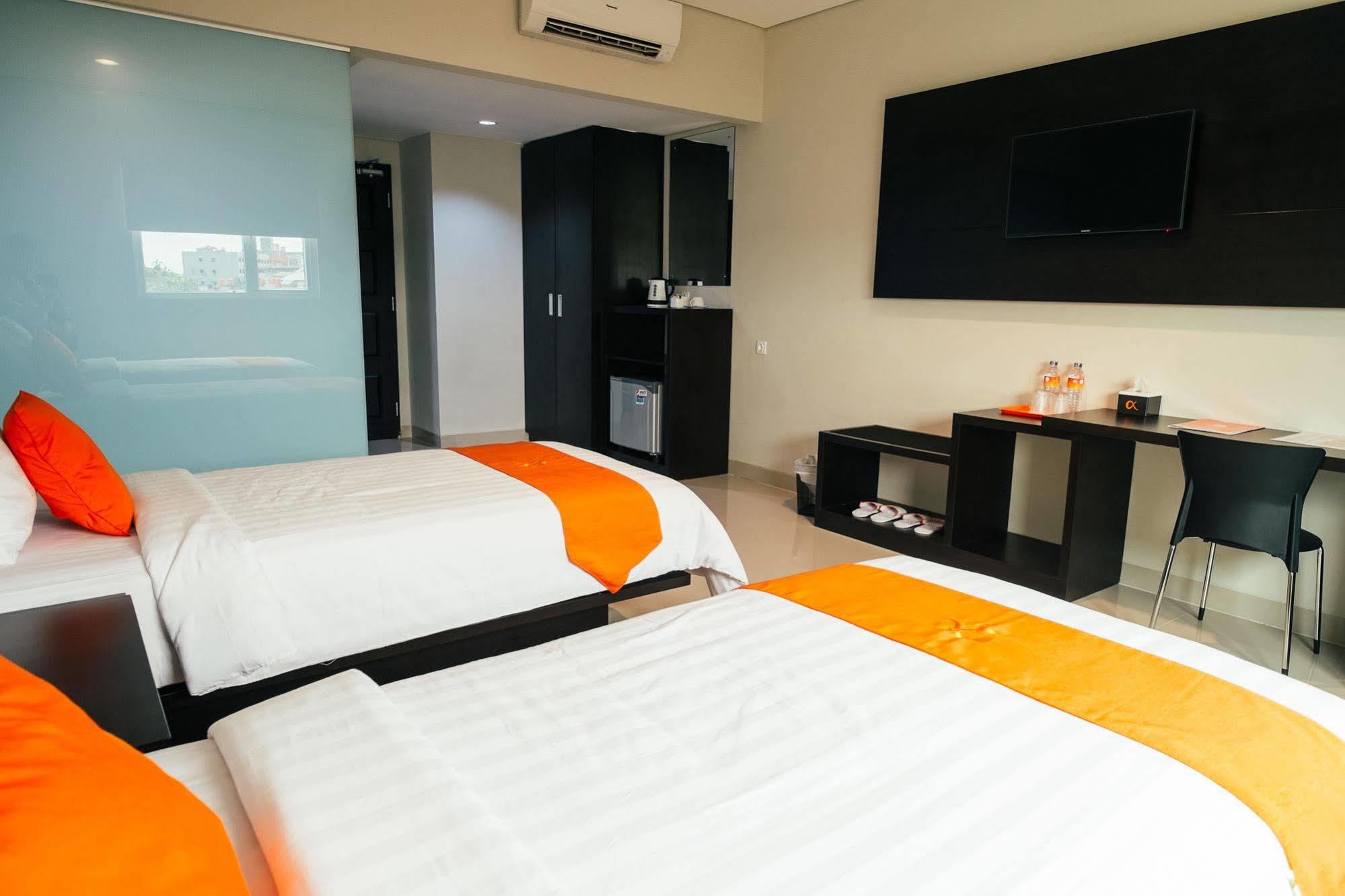 Alpha Hotel Пеканбару Экстерьер фото